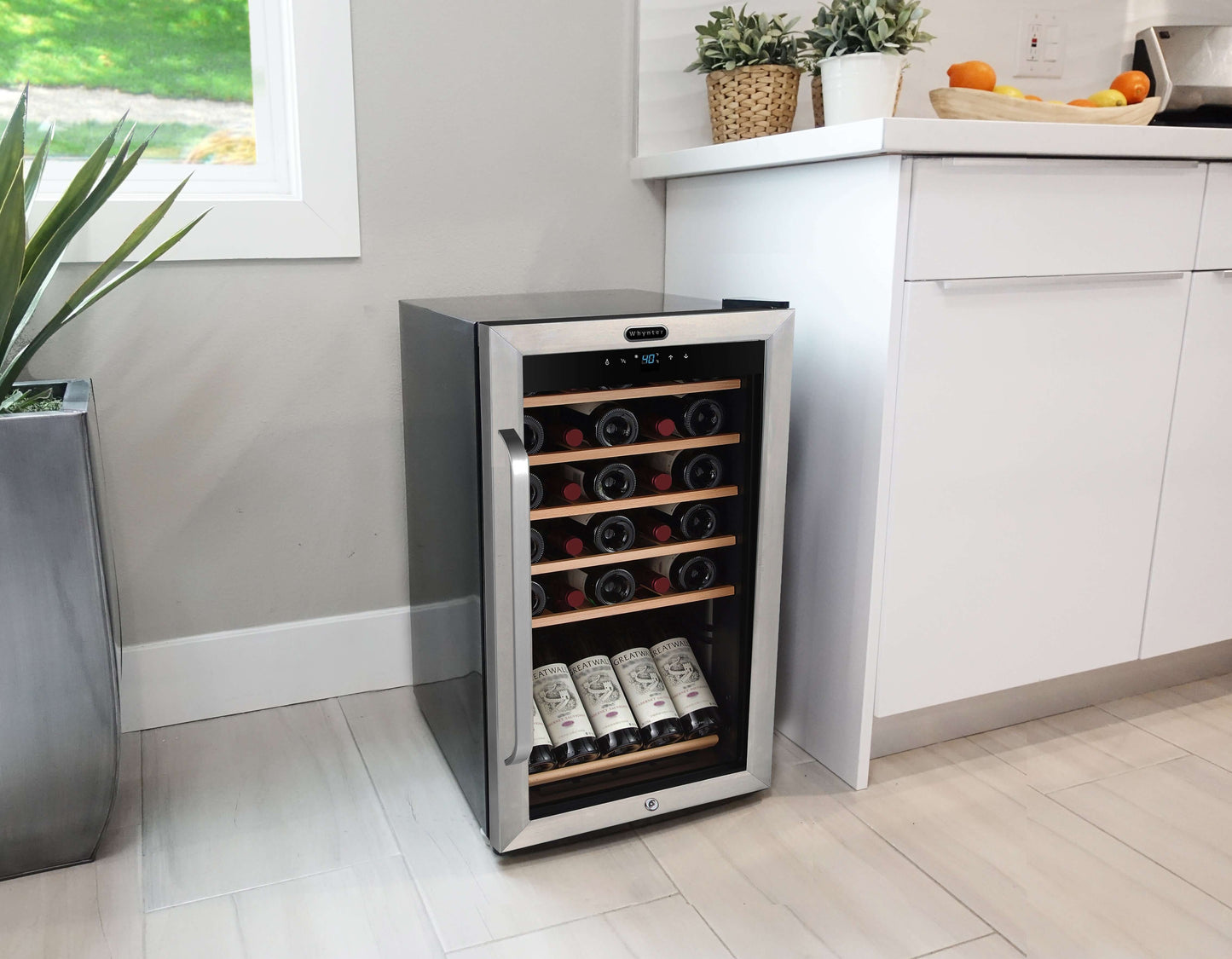 Whynter FWC-341TS 34 Bottle Freestanding Stainless Steel Wine Refrigerator with Display Shelf in kitchen