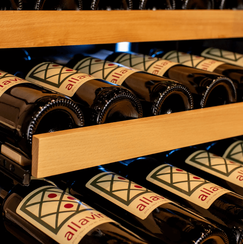 Allavino 119 Bottle 55" Tall Single Zone Stainless Steel Wine Refrigerator VSW11955S-1SL image of wine bottles on wine shelves