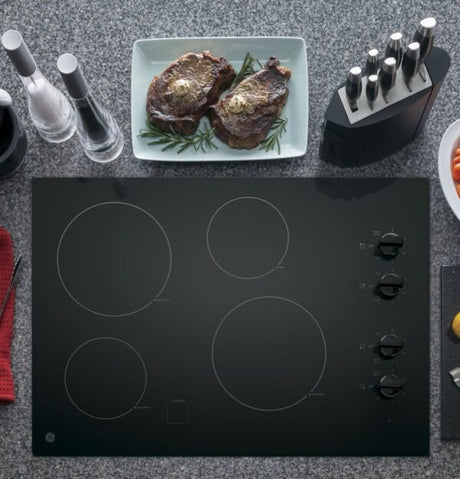 GE 30″ Built - In Knob Control Electric Cooktop JP3030DWBB - Ezonesglobal - Buy at Wine Coolers Online